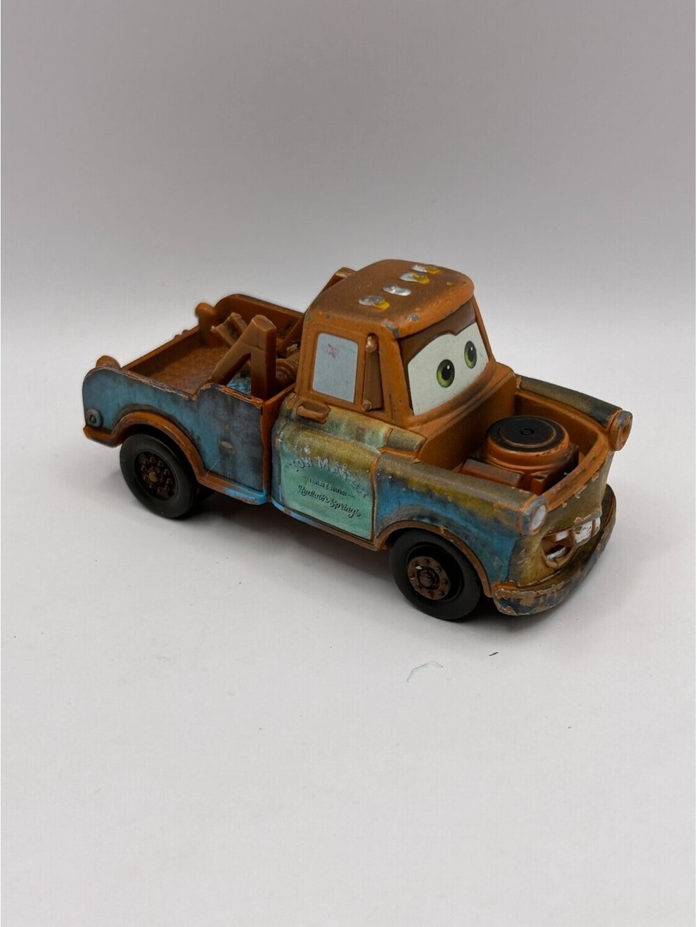 Mattel Tow Mater Diecast Toy Truck 1:55 Scale Brown chevron hazard